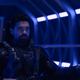 James Holden pilots the Rocinante in a blue-tinged shot from The Expanse.